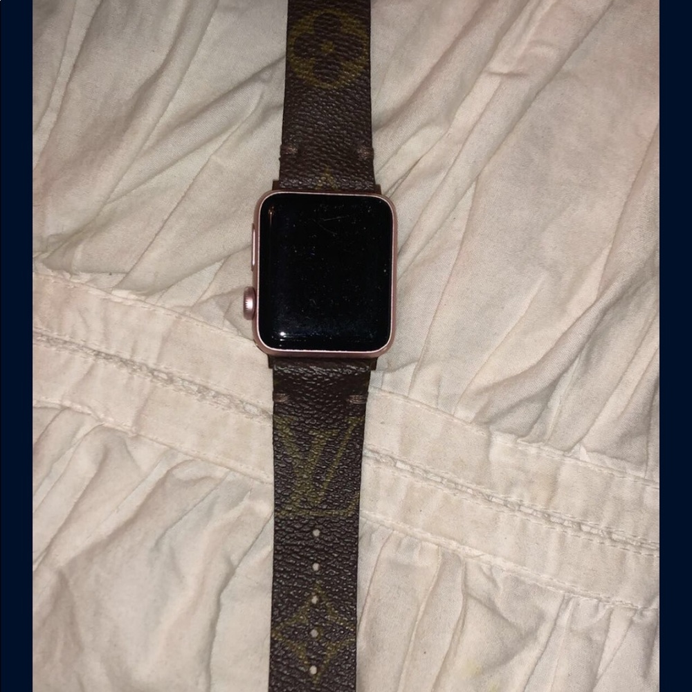 Rose gold Apple Watch with Louis Vuitton band